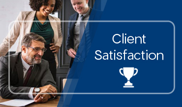 Client satisfaction: image of attorneys sitting around a computer